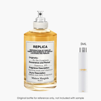Maison Margiela Replica By the Fireplace EDT by Maison Martin Margiela for Unisex — fragrance bottle close-up | Venba...